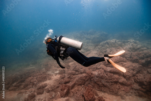 Woman swimming undersea at Del Coco beach