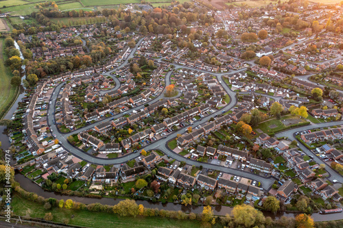 UK, England, Whittington, Aerial view of riverside town at dusk photo