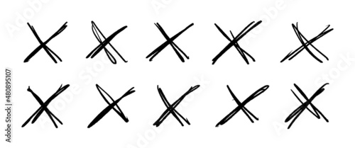 A set of drawn crosses. Scribble strikethrough markers isolated on white background. Doodle prohibition element. Vector illustration of a checkmark.