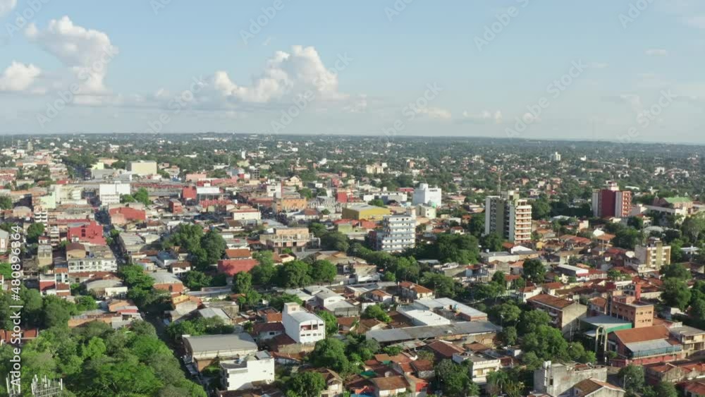 Aerial view Asuncion Paraguay. Latin American architecture in the capital with low-rise buildings and skyscrapers, the roads on which cars drive. Aerial view Asuncion Paraguay. Latin American architecture in the capital with low-rise buildings and skyscrapers, the roads on which cars drive.