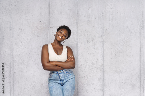  portrait of young happy woman looks in camera