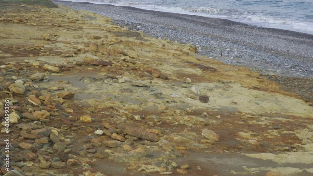 Close-up of extractive waste washed up on a beach in Greece.
Close-up of extractive waste washed up on a beach in Greece.