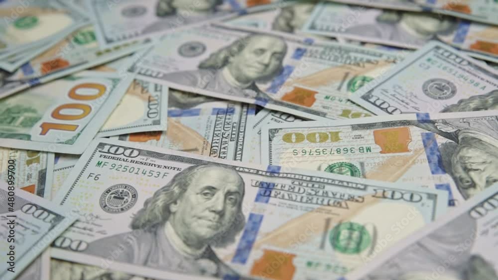 American dollars bills background, moving usd banknotes, inflation and economy concept, world finance crisis American dollars bills background, moving usd banknotes, inflation and economy concept, world finance crisis