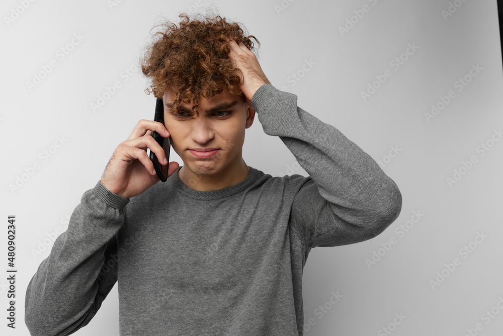 handsome guy looking at the phone fashion Lifestyle unaltered handsome guy looking at the phone fashion Lifestyle unaltered
