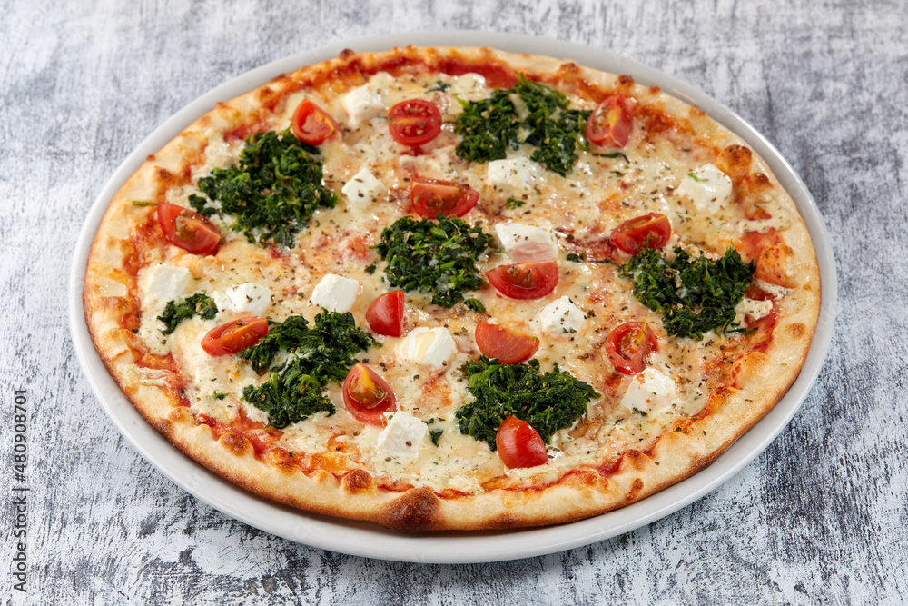 fresh pizza on the white plate fresh pizza on the white plate