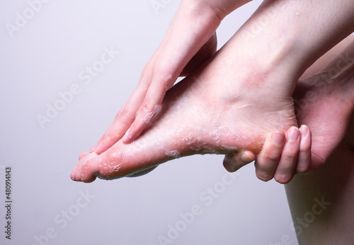 Washing your feet. Foam feet. Wash your feet with soap