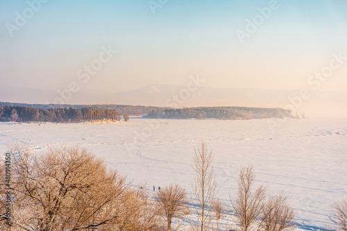 Winter frosty landscape on the Volga river with a beautiful sky. Top view, soft focus © KseniaJoyg