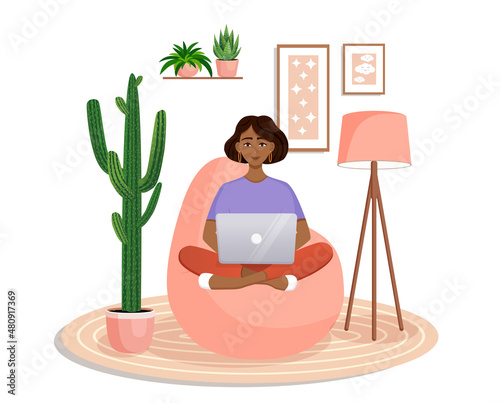 Woman is sitting on a bean bag chair at home at a laptop computer. Remote work, office at home, programming, freelance. Study at home in quarantine. Vector illustration. Cozy interior.
