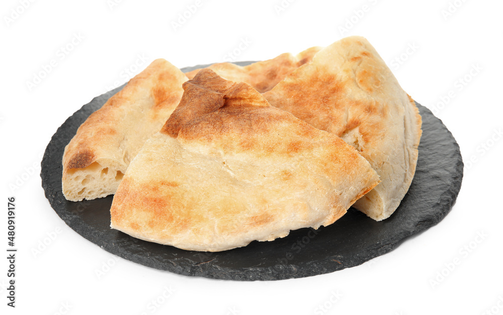 Cut fresh pita bread with slate plate on white background Cut fresh pita bread with slate plate on white background