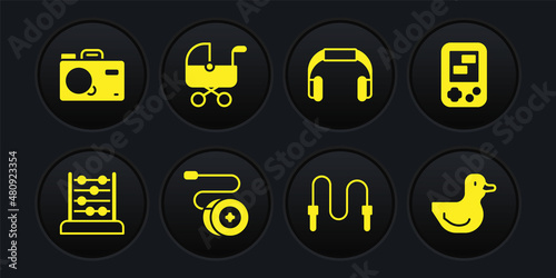 Set Abacus, Tetris electronic game, Yoyo toy, Jump rope, Headphones, Baby stroller, Rubber duck and Photo camera icon. Vector