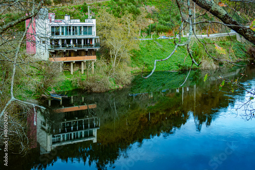 Reflexoxs na agua as margens do rio Vouga, freguesia de S. Tiago em Sever do Vouga, Aveiro, Portugal.  photo