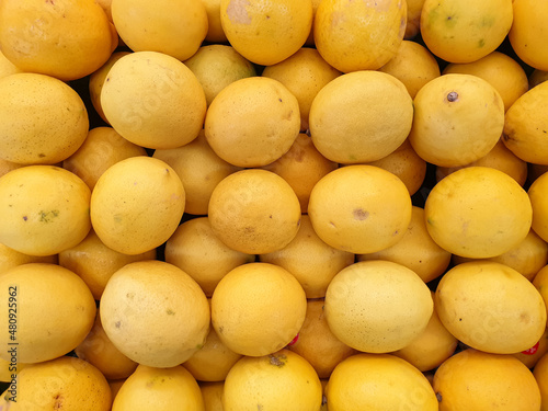 top view of fresh lemons on the supermarket shelf