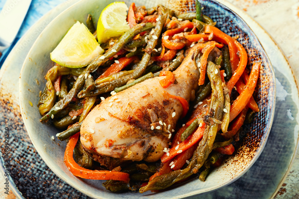 Chicken legs stewed with spices and vegetables. Chicken legs stewed with spices and vegetables.