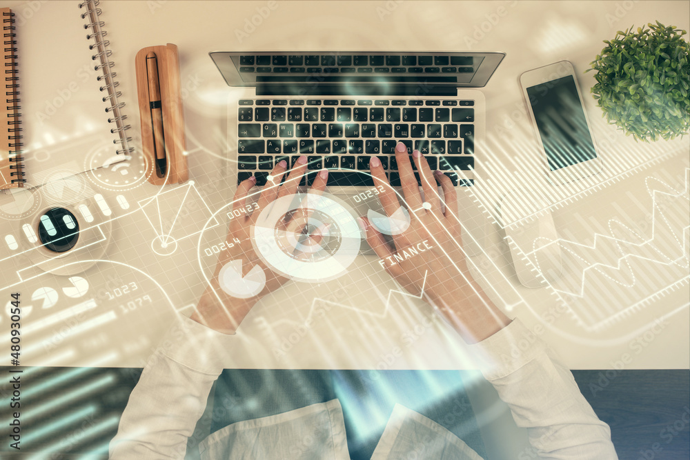 Double exposure of woman hands working on computer and tech theme hologram drawing. Top View. Technology concept. Double exposure of woman hands working on computer and tech theme hologram drawing. Top View. Technology concept.