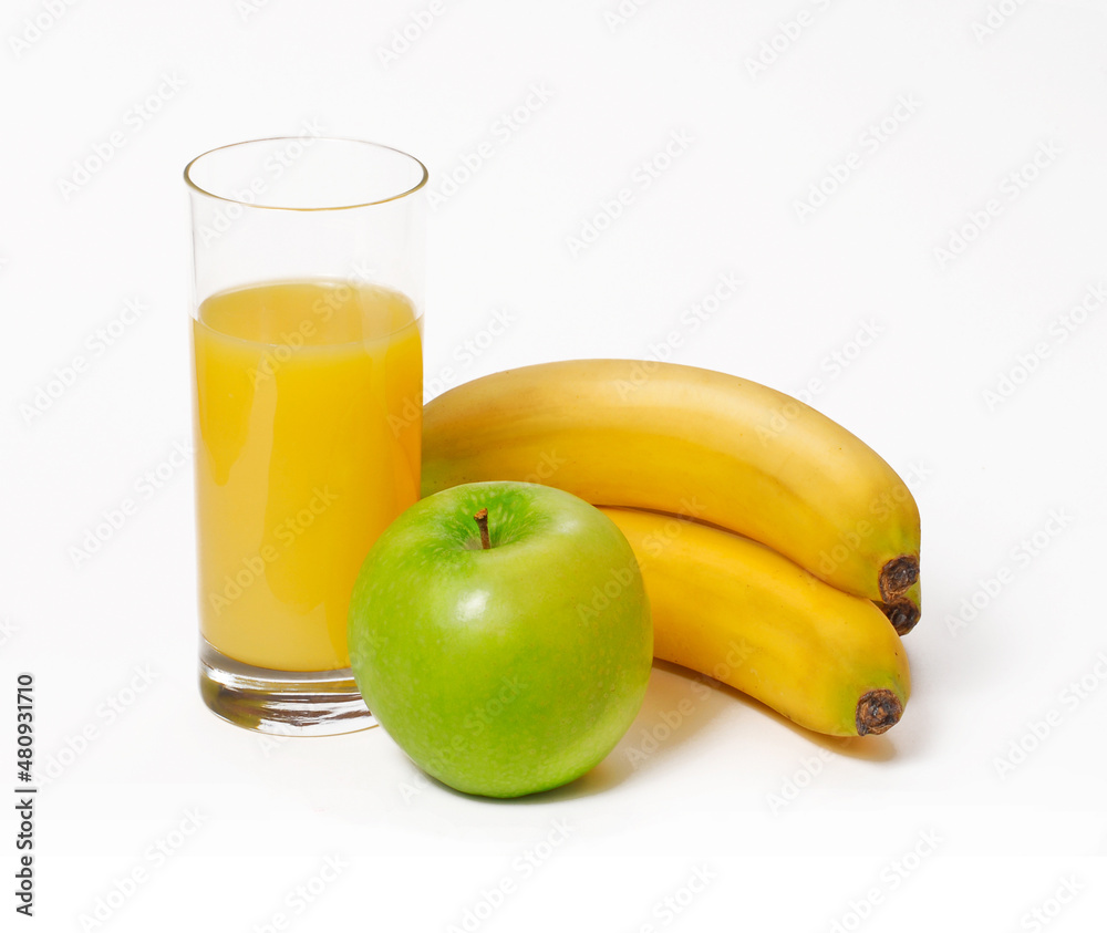 Orange juice glass and fapple banana ruits on white background. Orange juice glass and fapple banana ruits on white background.
