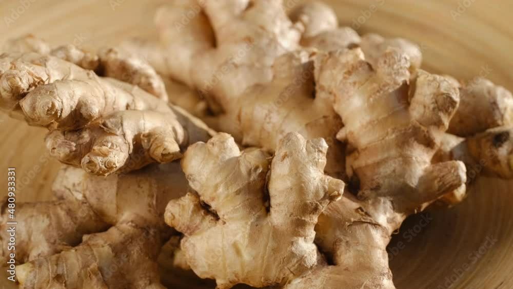 Whole ginger root on close up rotating 4K Whole ginger root on close up rotating 4K