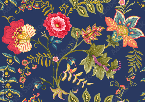 Fantasy flowers in retro, vintage, jacobean embroidery style. Seamless pattern on blue denim background. Vector illustration.