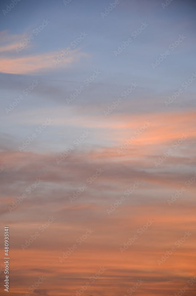 Sunset sky background with clouds