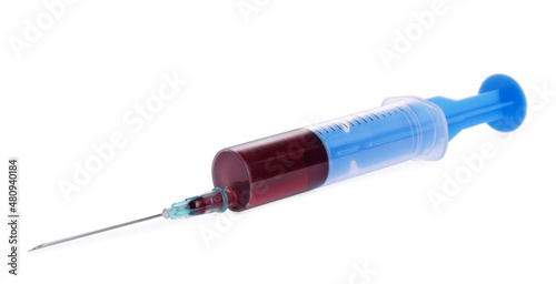 Plastic syringe with blood isolated on white