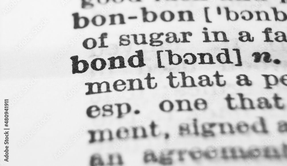 Bond dictionary definition close-up. Shallow depth of field. Bond dictionary definition close-up. Shallow depth of field.