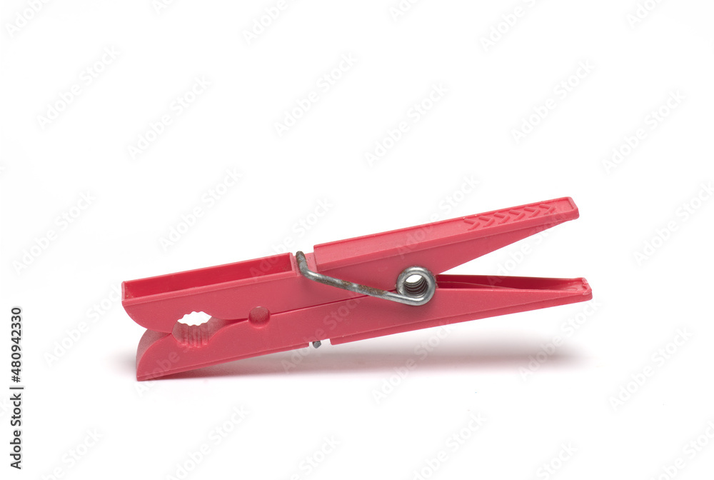 red plastic clothespin metal spring white background red plastic clothespin metal spring white background