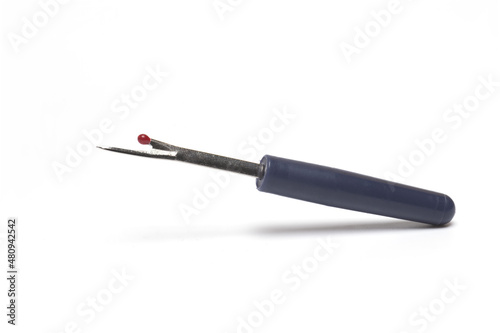 cutting needle unraveling seams tailoring white background