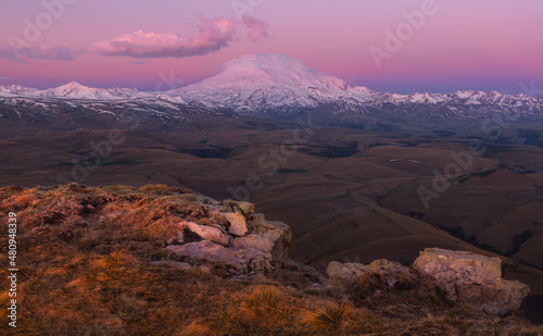 Russia  Caucasus Mountains  Kabardino-Balkaria. Snow-Covered Sleeping Volcano Elbrus At Daybreak.Epic View Of Elbrus From The Northeast Side. Highest Two-Peak Mountain In Russia And Europe