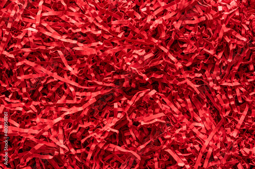 Close up on red shredded paper stripes