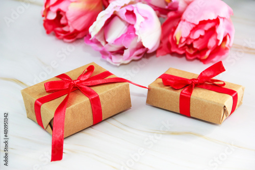 pink tulips and gift boxes