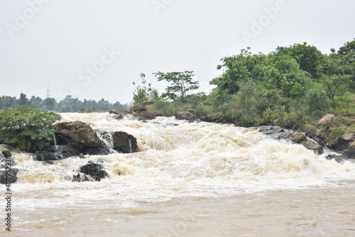 water flowing over the river