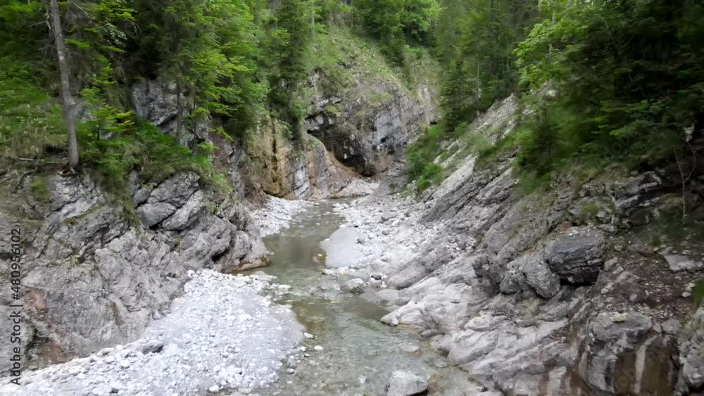 Small stream in a canyon in the bavarian alps, Aerial drone shot in 4k, gorge gulch ravine river Small stream in a canyon in the bavarian alps, Aerial drone shot in 4k, gorge gulch ravine river