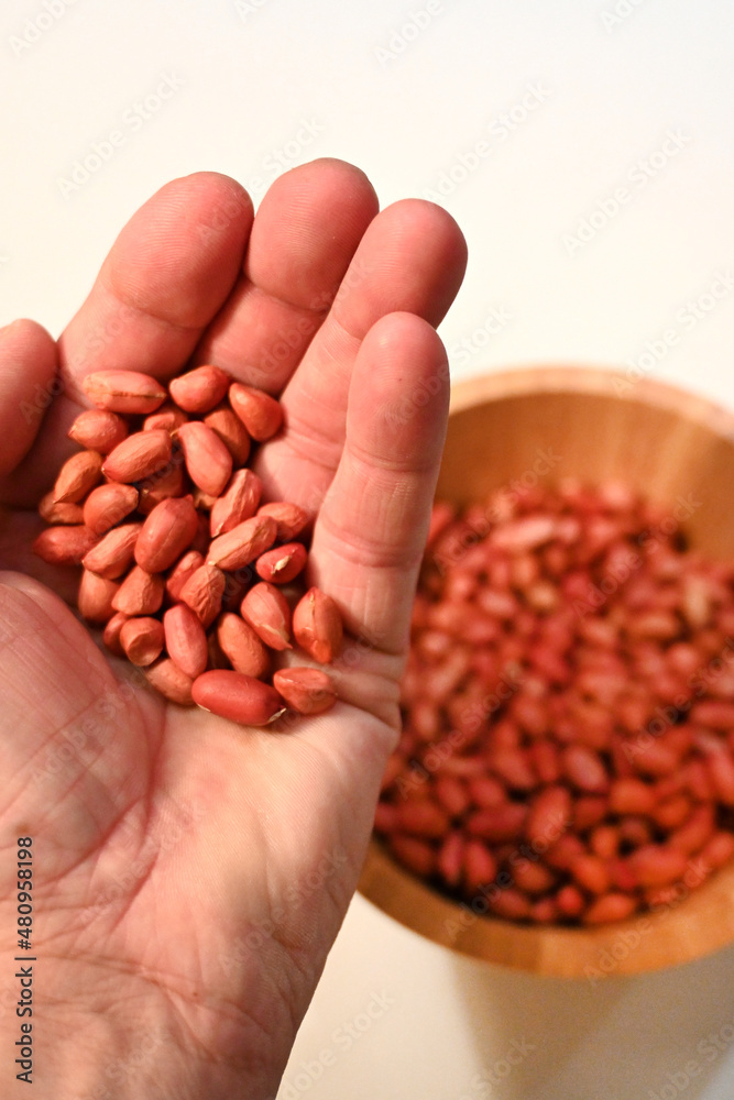 hand full pr redskin peanuts, vegan and vegetarian friendly snack hand full pr redskin peanuts, vegan and vegetarian friendly snack