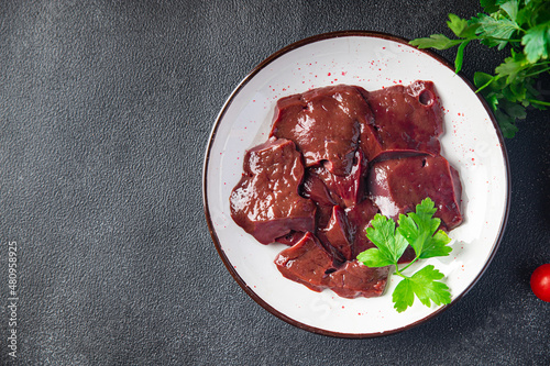 Canvastavla raw liver pork, beef offal meat healthy meal food snack on the table copy space