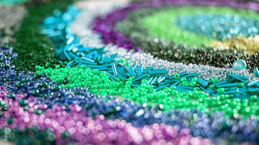 Obraz premium Beads banner. Multicolored beads background .Handicraft and hobby banner. Weaving and embroidery with beads concept
