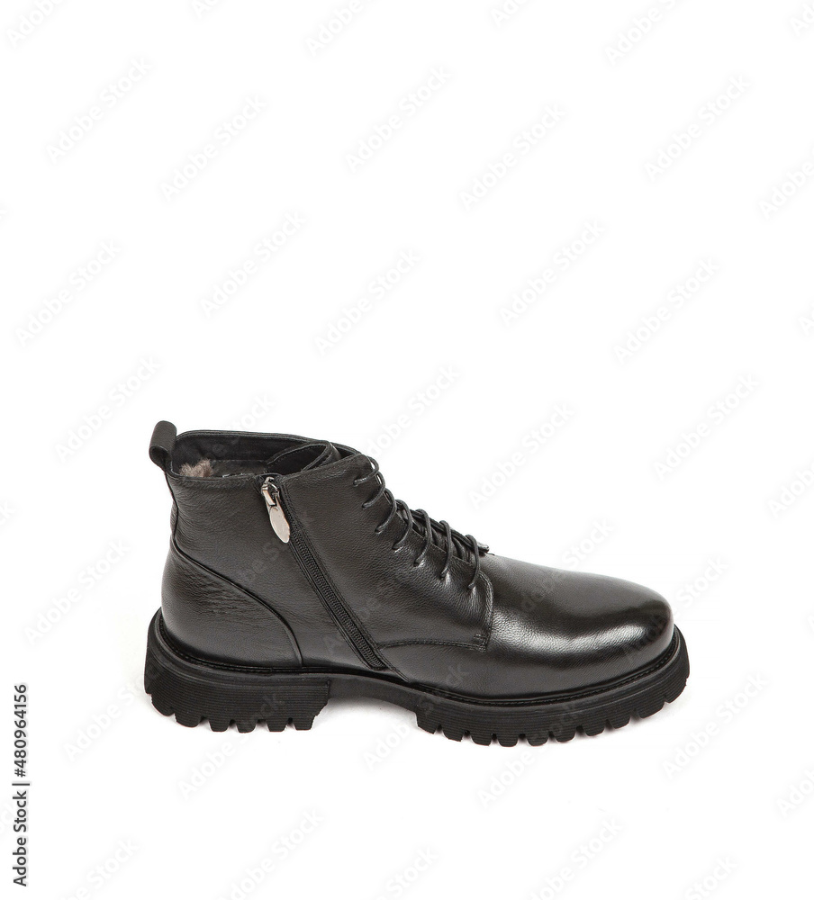 Men black winter leather boots with fur inside isolated on white background Men black winter leather boots with fur inside isolated on white background