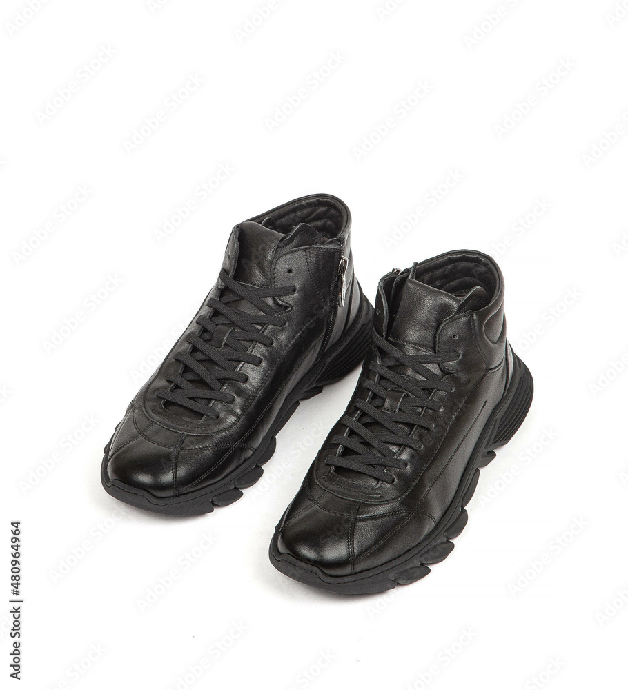 Men black winter leather boots with fur inside isolated on white background