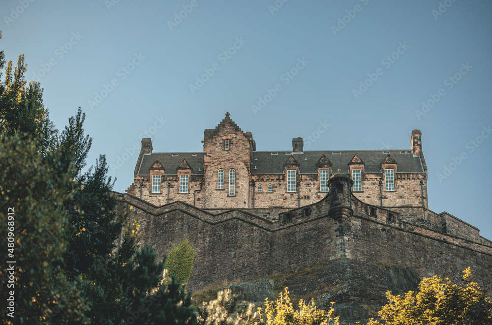 Edinburgh in Scotland, with the royal castle occupying a commanding position atop a volcanic crag with cliffs on three sides and the fourth side facing the capital city of Edinburgh