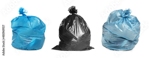 Set with trash bags filled with garbage on white background. Banner design photo