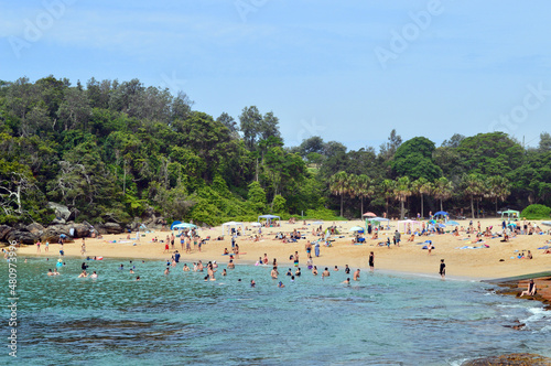 People swimming at Shelly Beach in Sydney, Australia photo