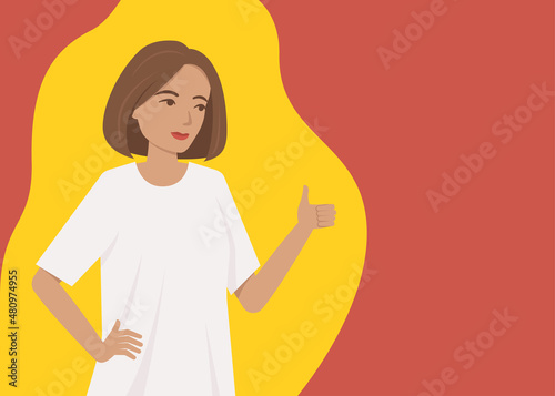 Girl in an oversize T-shirt shows thumbs up