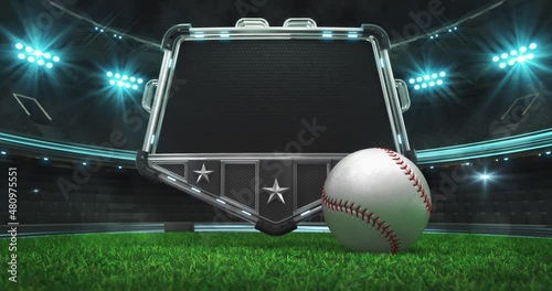 Rolling baseball ball and steel shield with empty space for advertisement text. Green grass field and illuminated sport arena with light flashes. Two 4K video parts of loopable sport intro. photo