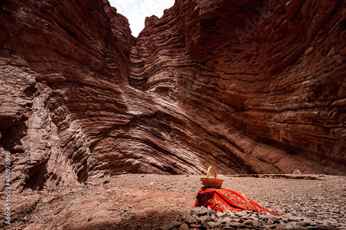 Wallpaper Mural Basket with native fabric in the Amphitheater formation in the Quebrada de las Conchas, Salta, Argentina Torontodigital.ca
