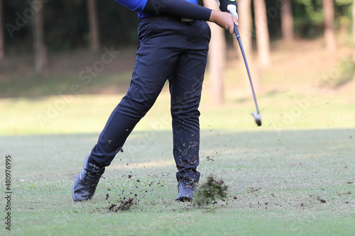 Young male golfer player on golf course © Oran Tantapakul