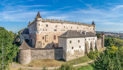 Aerial view of Zvolen castle in Slovakia with Renaissance palace, outer ring of wall, turrets, corner tower, massive gate tower, Gothic Chapel