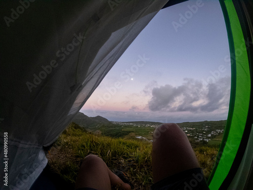 View of the moon duing sunset from a camping tent located on Deux Mamelles mountain at Beau Bois, Mauritius