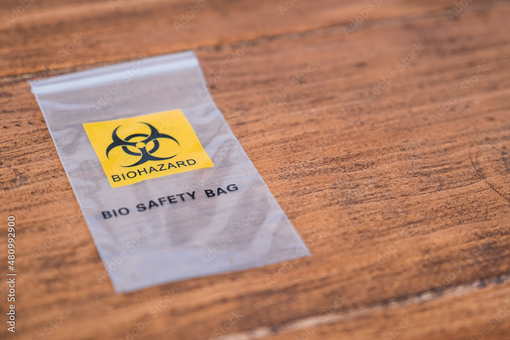 biohazard sachet for throwing away covid19 test results Stock Photo Adobe Stock