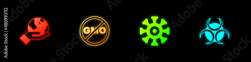 Set Hand holding Earth globe, No GMO, Bacteria and Biohazard symbol icon. Vector