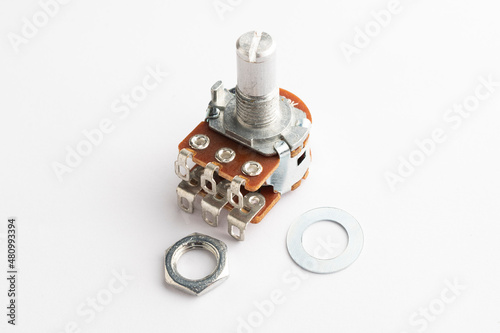 Dual potentiometer electronic component on white background photo