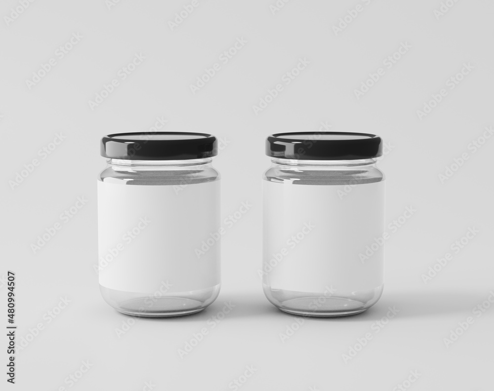 Bottled jam on a white background, glass bottle with label Bottled jam on a white background, glass bottle with label