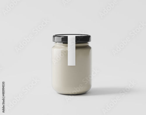 Bottled jam on a white background, glass bottle with label